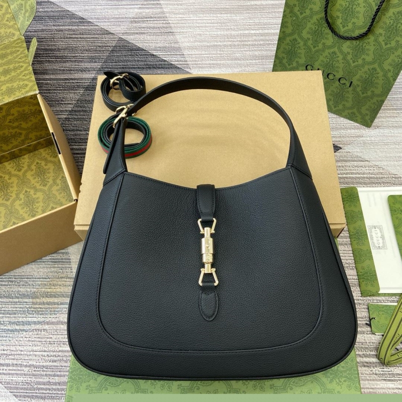 G*u*i top handle bags